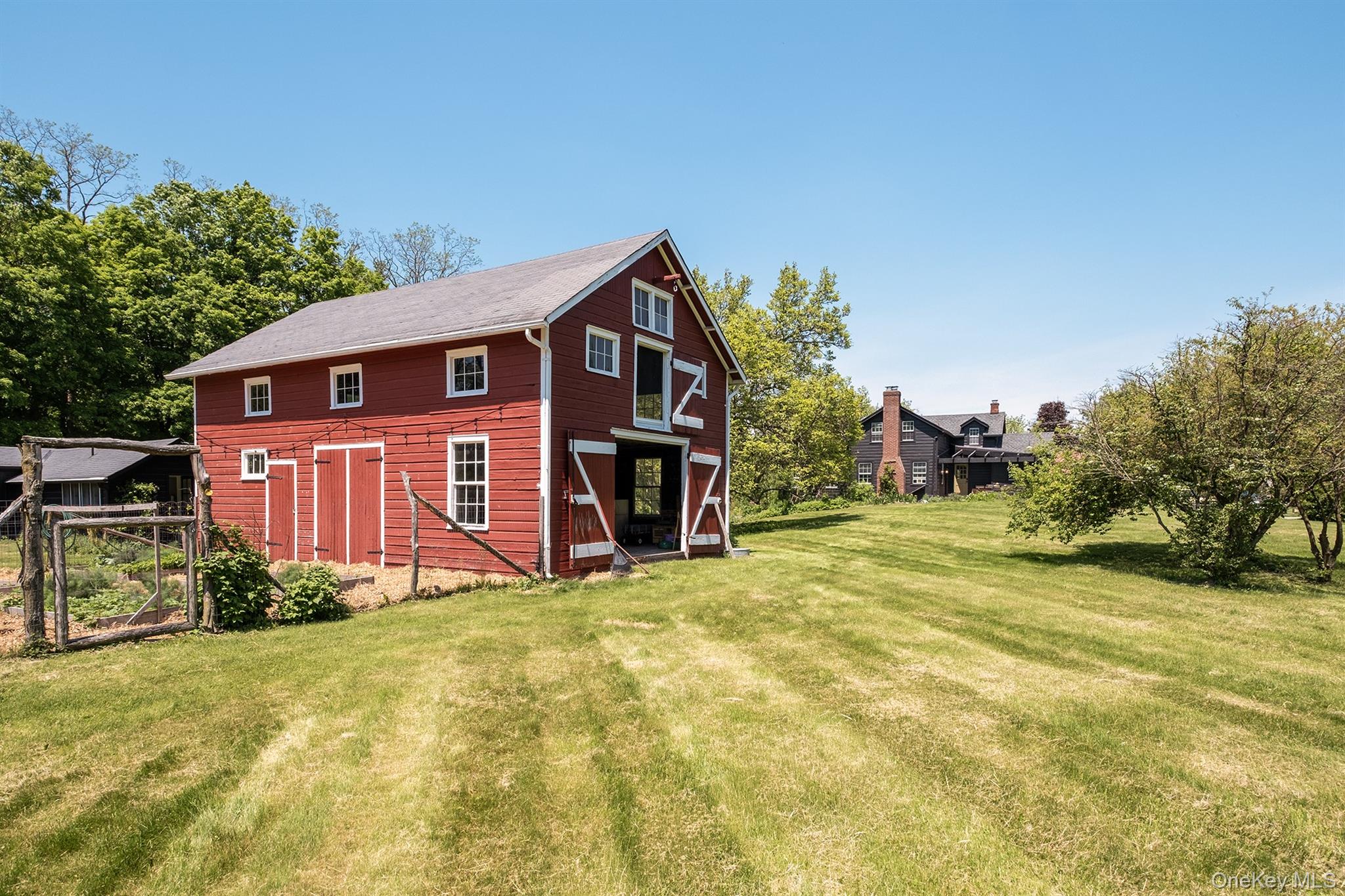 77 Upper Hook Road Rhinebeck, NY 12572 - Photo 35 of 48 a view of a house with a yard and garage