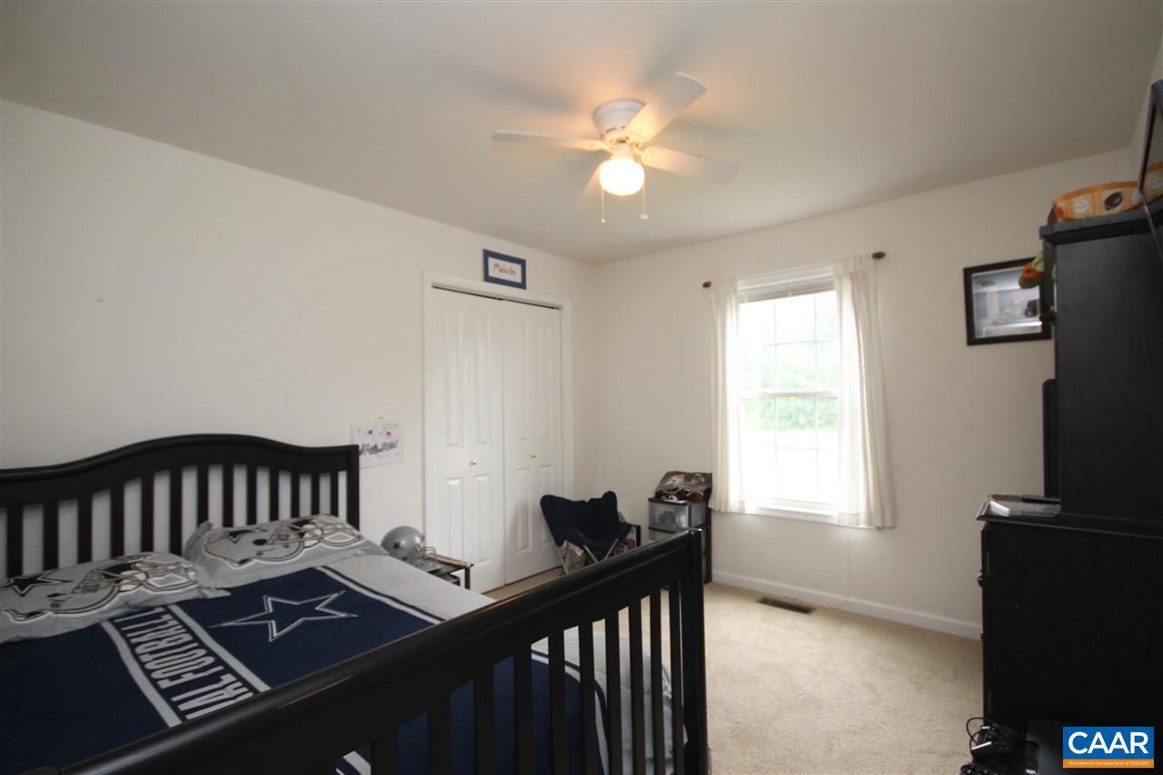 1566 Bybee Road Louisa, VA 23093 - Photo 23 of 34 a view of a room with furniture and a flat screen tv