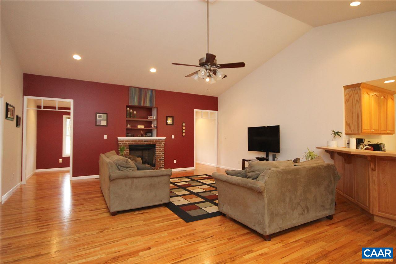 1566 Bybee Road Louisa, VA 23093 - Photo 7 of 34 a living room with furniture and a flat screen tv