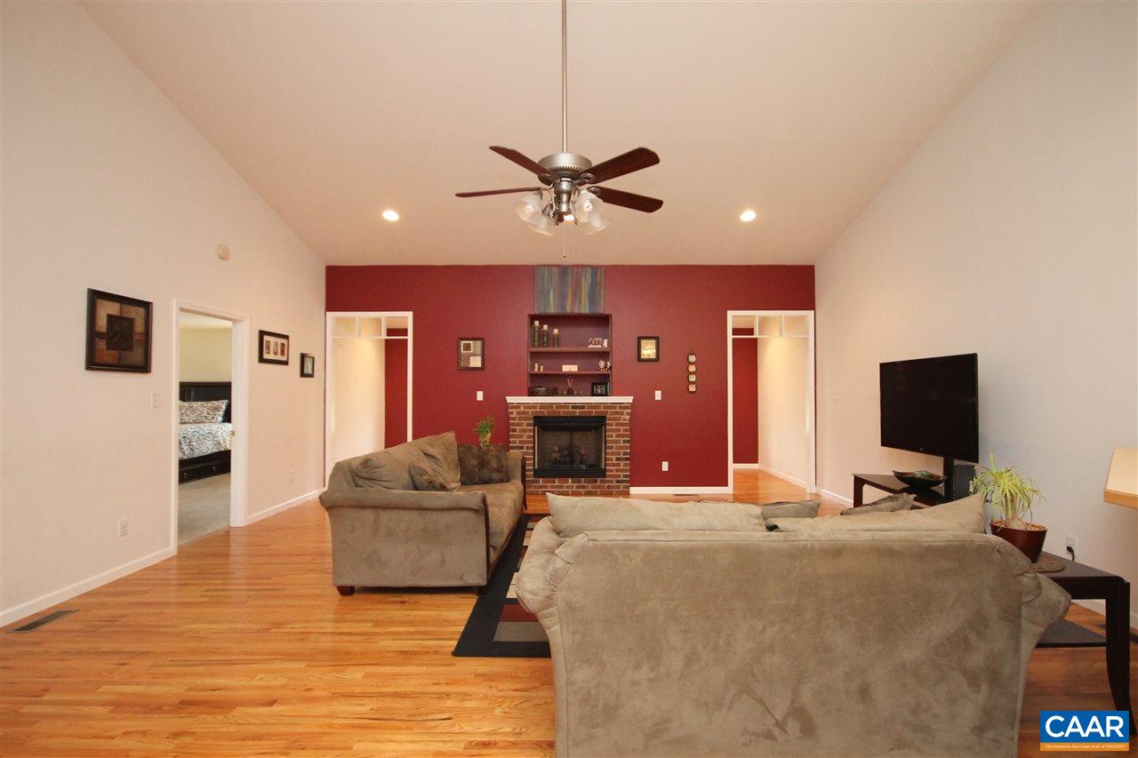 1566 Bybee Road Louisa, VA 23093 - Photo 8 of 34 a living room with furniture and a flat screen tv