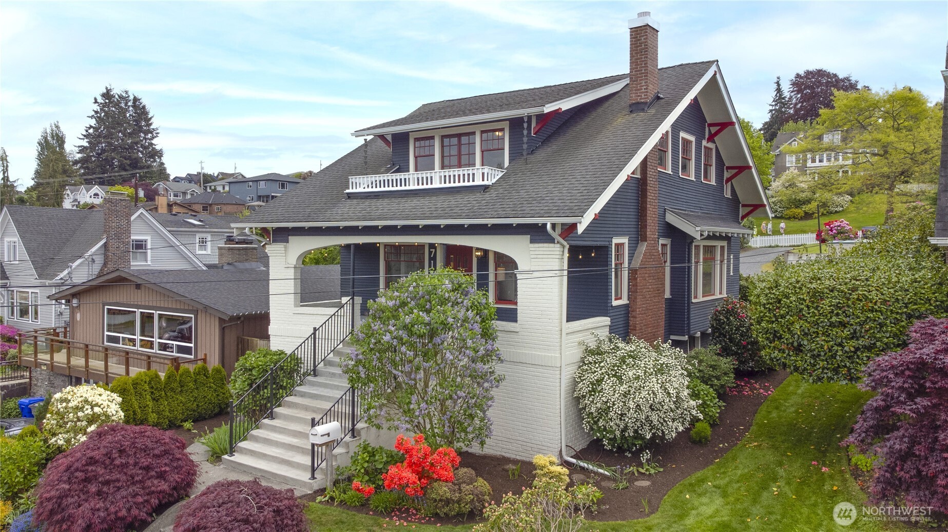 712 33rd Street Everett, WA 98201 - Photo 1 of 29 a front view of a house with a yard and potted plants