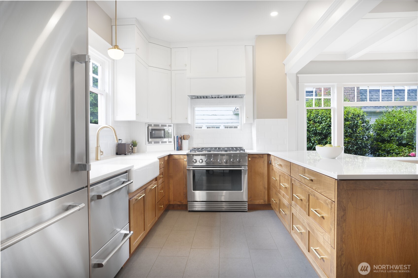 712 33rd Street Everett, WA 98201 - Photo 11 of 29 a kitchen with stainless steel appliances granite countertop a stove and a sink