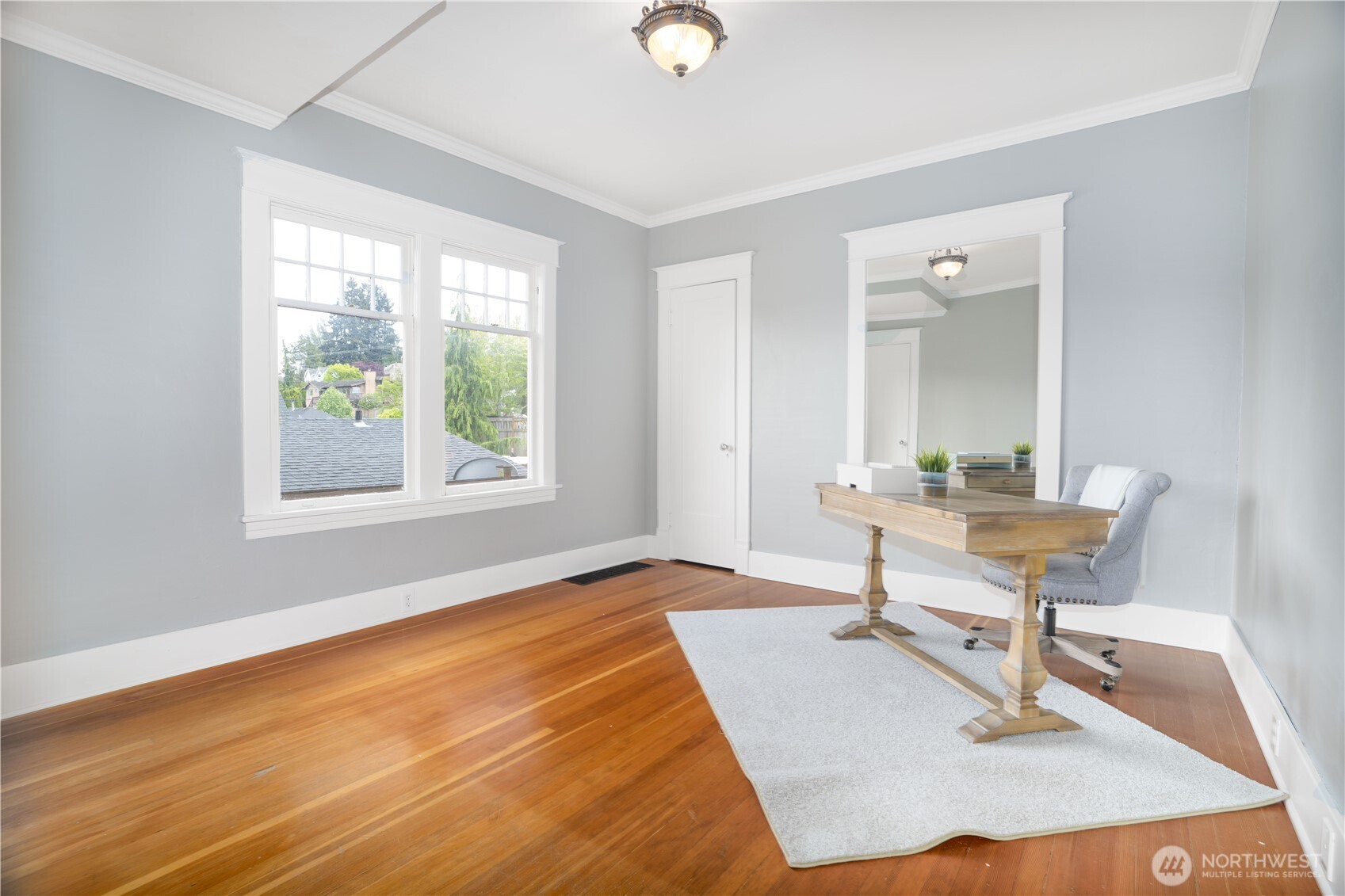 712 33rd Street Everett, WA 98201 - Photo 12 of 29 a view of a workspace with furniture and a window