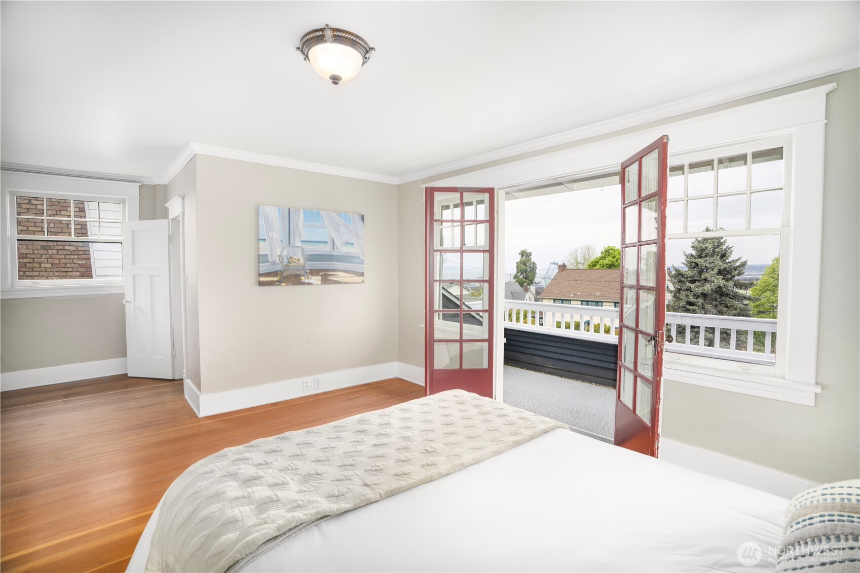 712 33rd Street Everett, WA 98201 - Photo 15 of 29 a bedroom with a large bed and a window