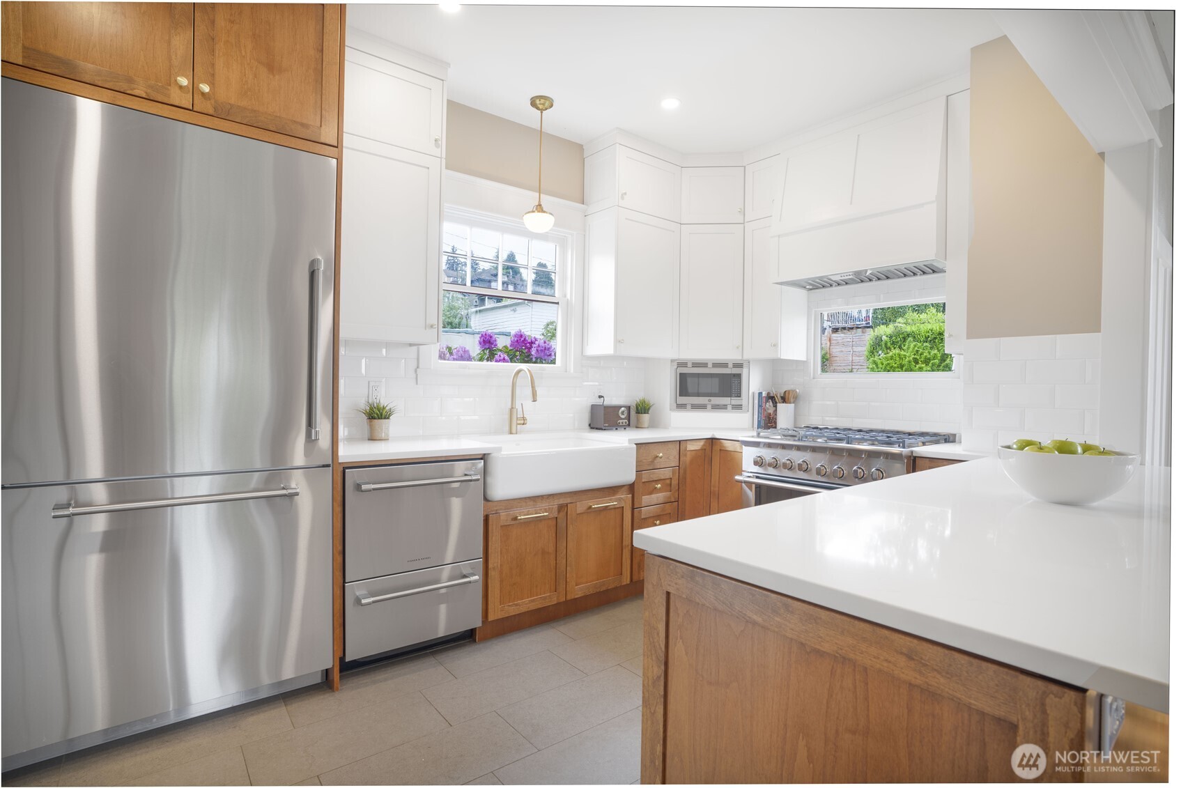 712 33rd Street Everett, WA 98201 - Photo 8 of 29 a kitchen with white cabinets and white appliances