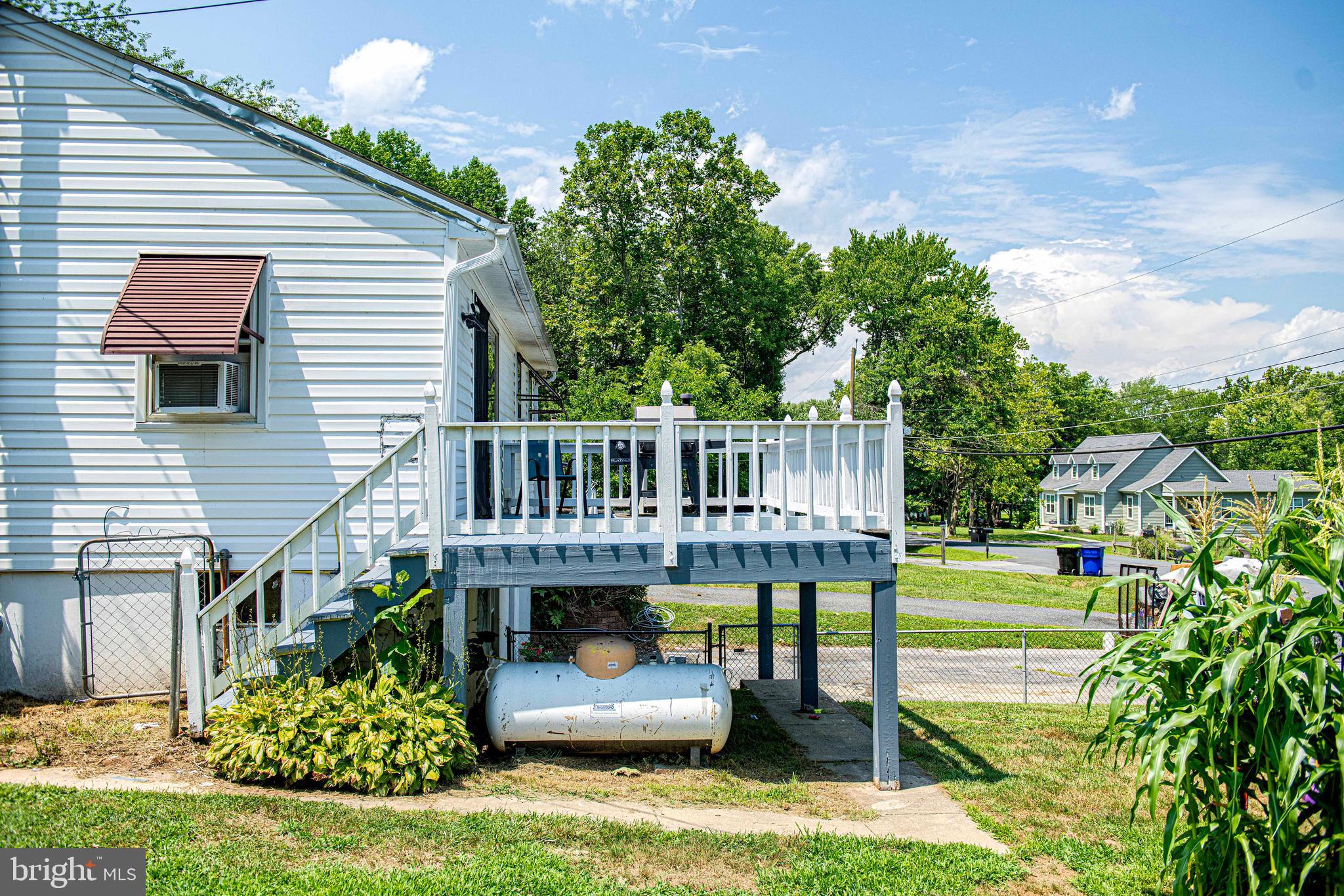 1563 Carpenters Point Road Perryville, MD 21903 - Photo 28 of 39 FRONT DECK WITH STAIRS TO SIDE YARD