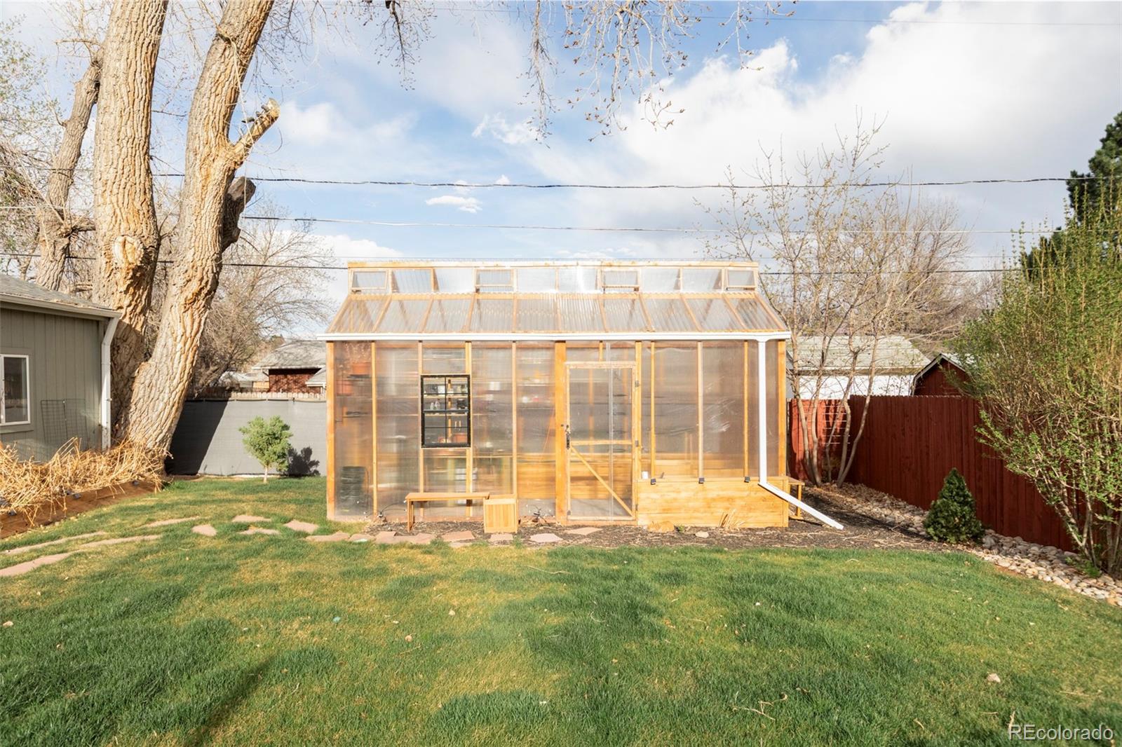 3406 South Stuart Street Denver, CO 80236 - Photo 33 of 34 a view of a backyard