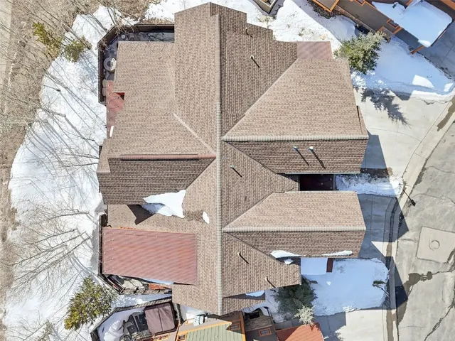 a front view of a house with parking space