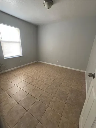 en empty room with windows