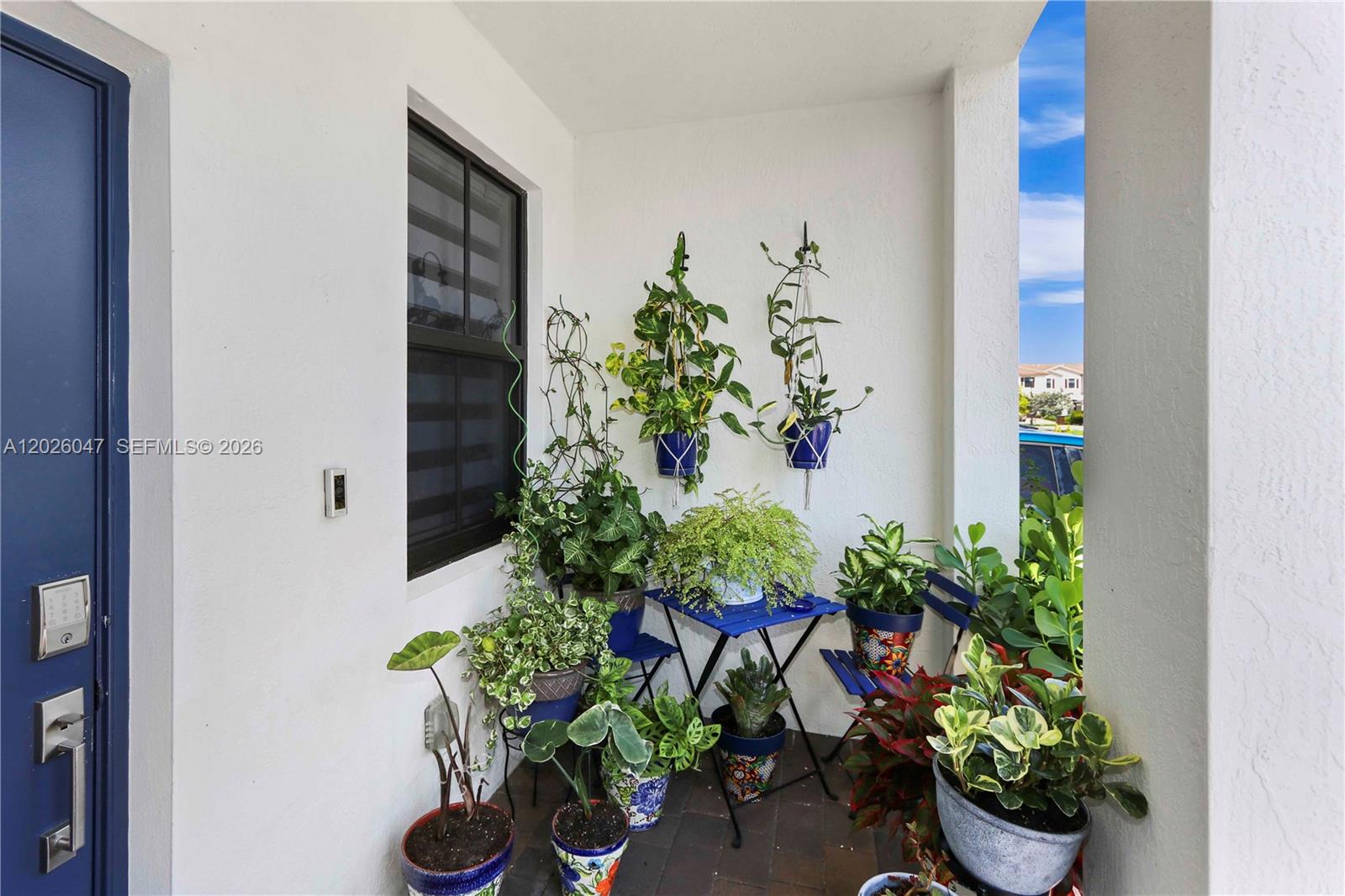 12862 Southwest 231st Street Miami, FL 33170 - Photo 5 of 30 a vase with flowers sitting on a floor