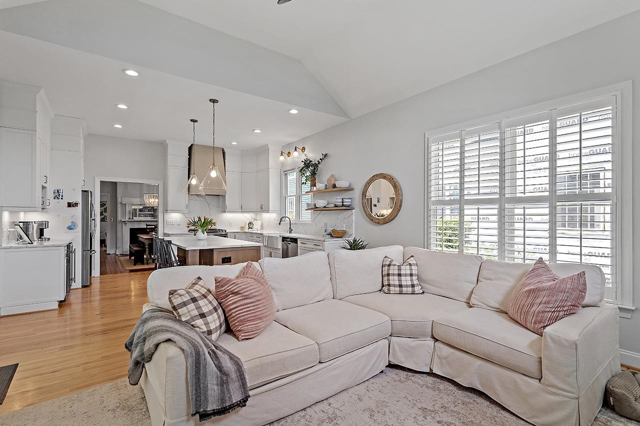 502 Cleveland Street Raleigh, NC 27605 - Photo 13 of 36 a living room with furniture and a large window