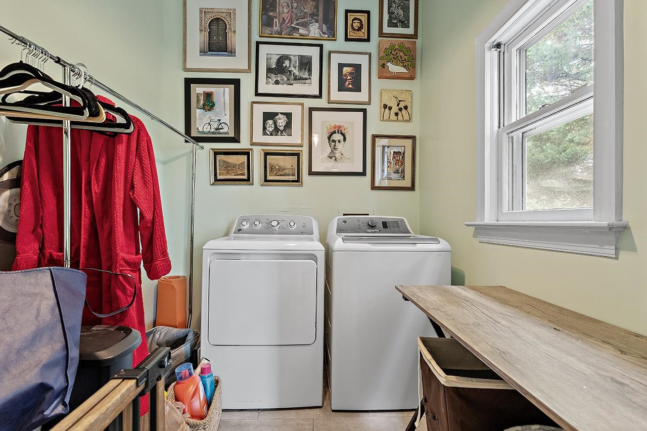 502 Cleveland Street Raleigh, NC 27605 - Photo 23 of 36 a utility room with dryer and washer