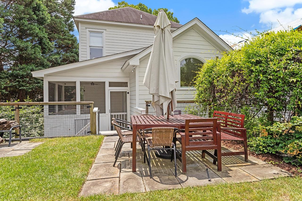 502 Cleveland Street Raleigh, NC 27605 - Photo 32 of 36 a view of a house with backyard and sitting area