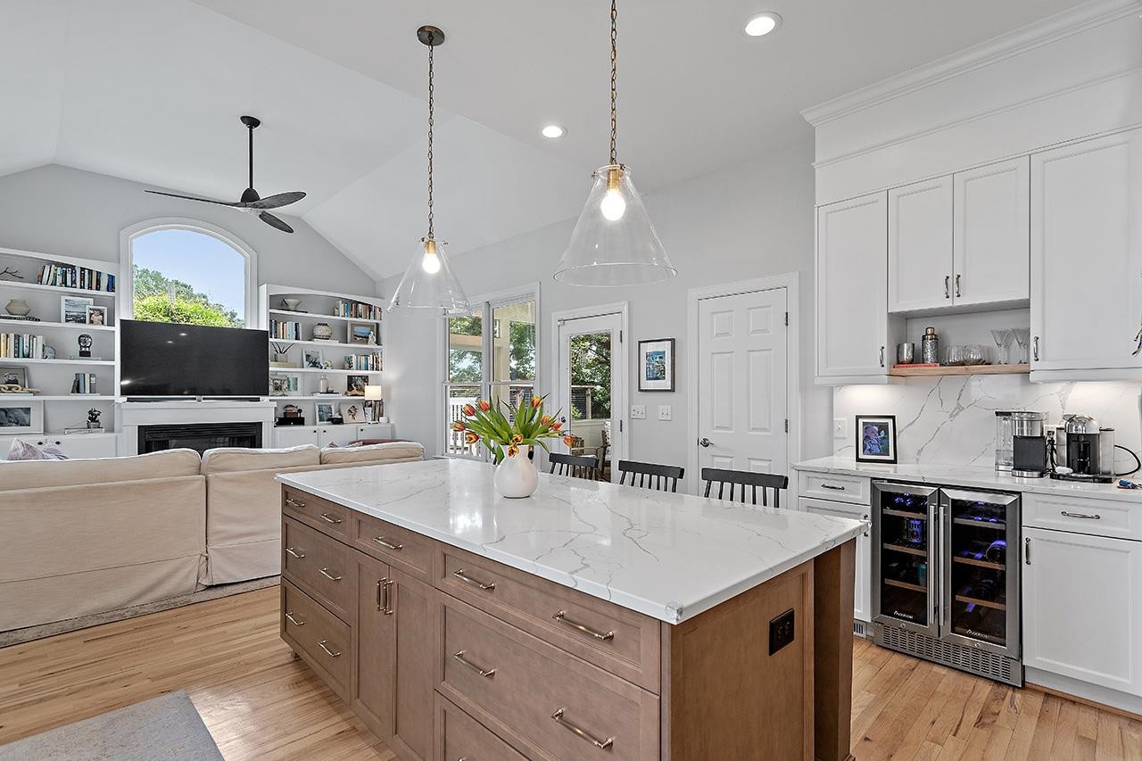 502 Cleveland Street Raleigh, NC 27605 - Photo 10 of 36 a kitchen with a sink stove and refrigerator