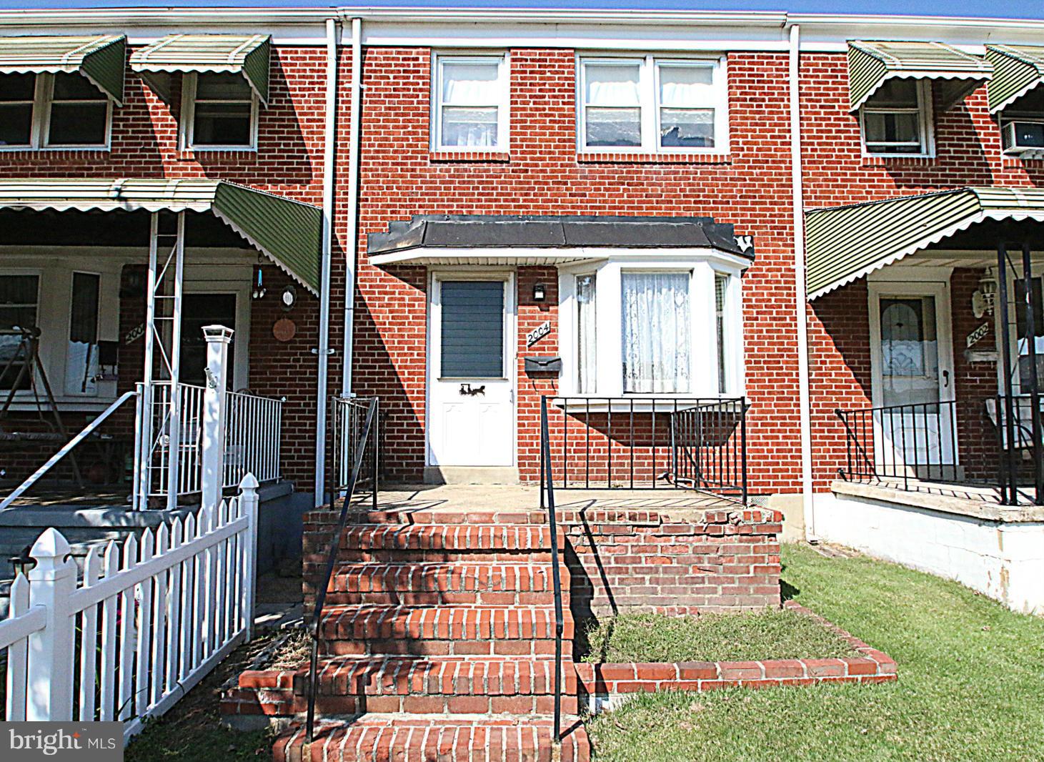2004 Jasmine Road Baltimore, MD 21222 - Photo 1 of 29 front view of a house with a yard
