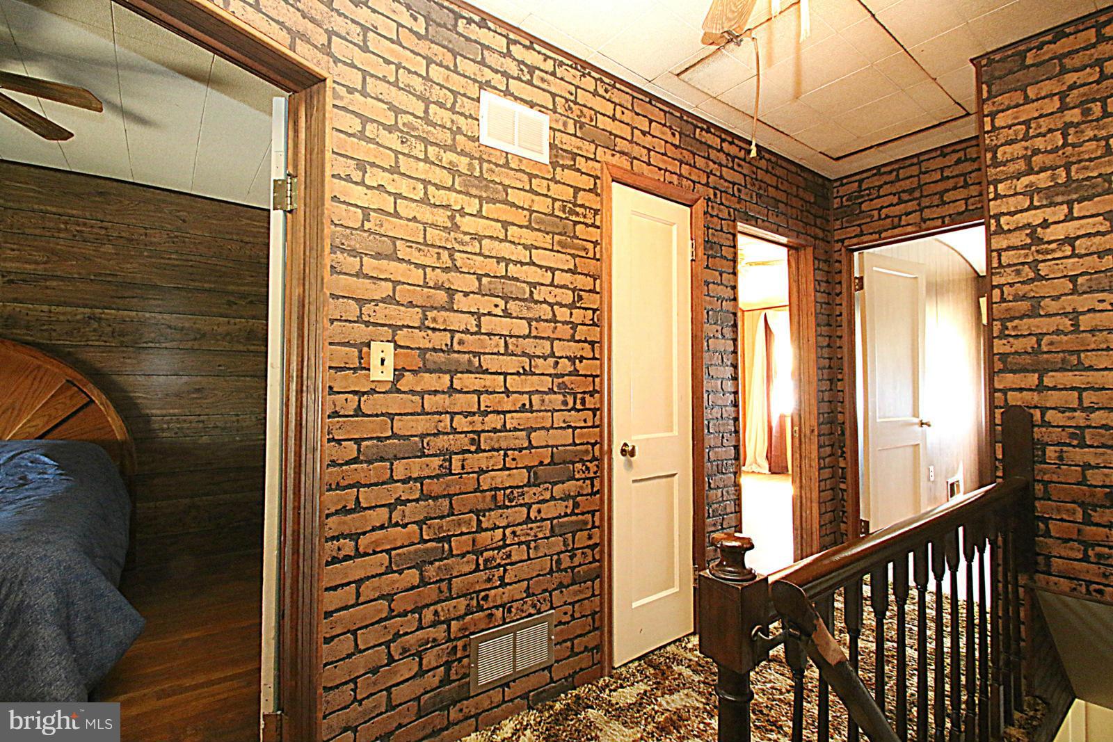 2004 Jasmine Road Baltimore, MD 21222 - Photo 13 of 29 a view of a brick house with a large window