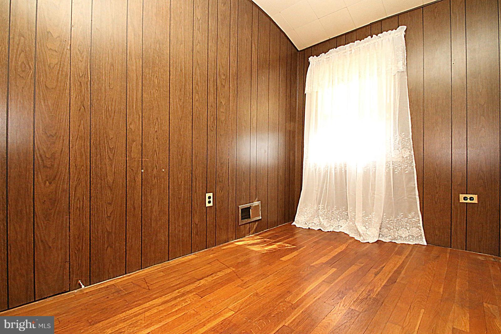 2004 Jasmine Road Baltimore, MD 21222 - Photo 22 of 29 a bed room with a bed and a window