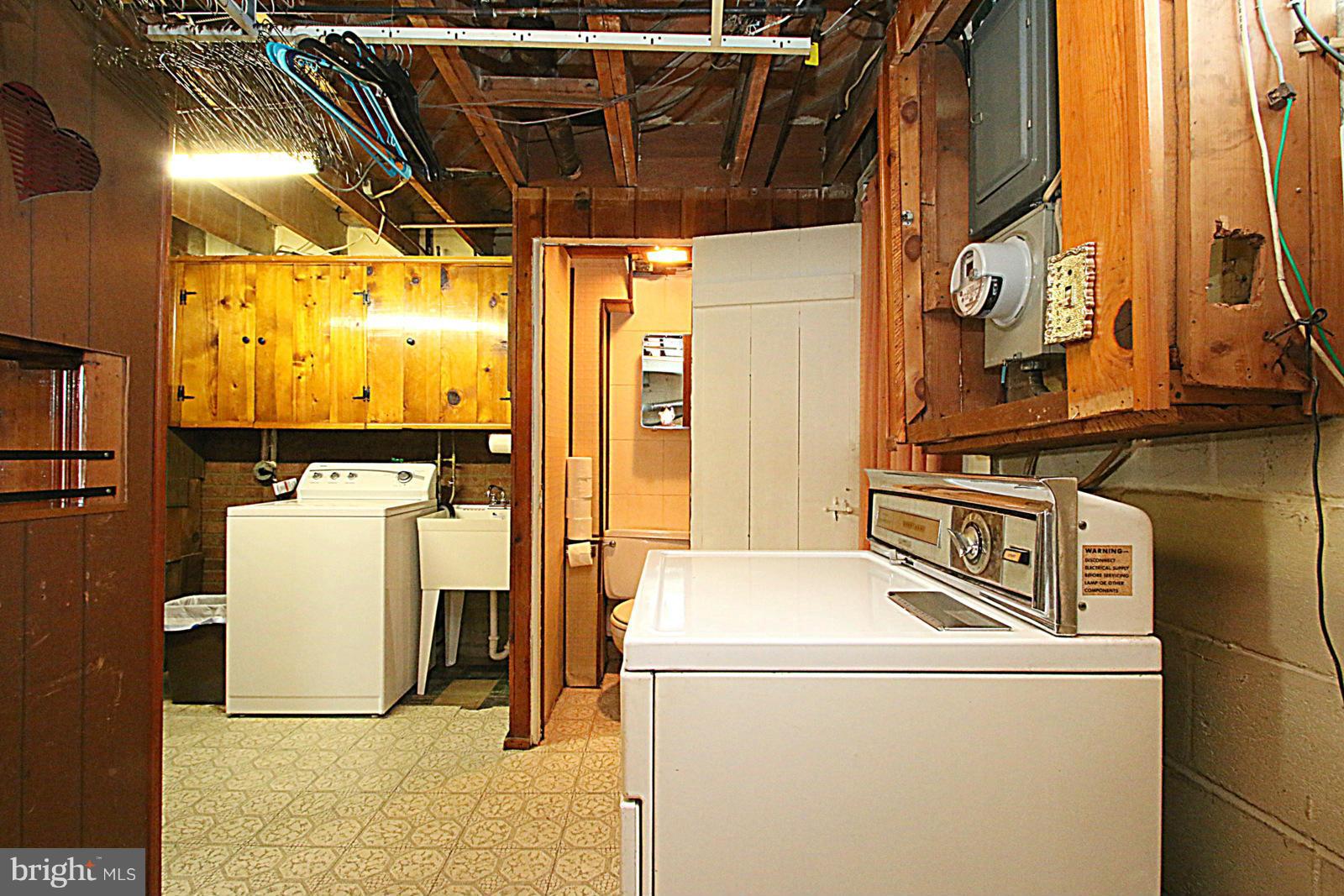 2004 Jasmine Road Baltimore, MD 21222 - Photo 27 of 29 a utility room with dryer and washer