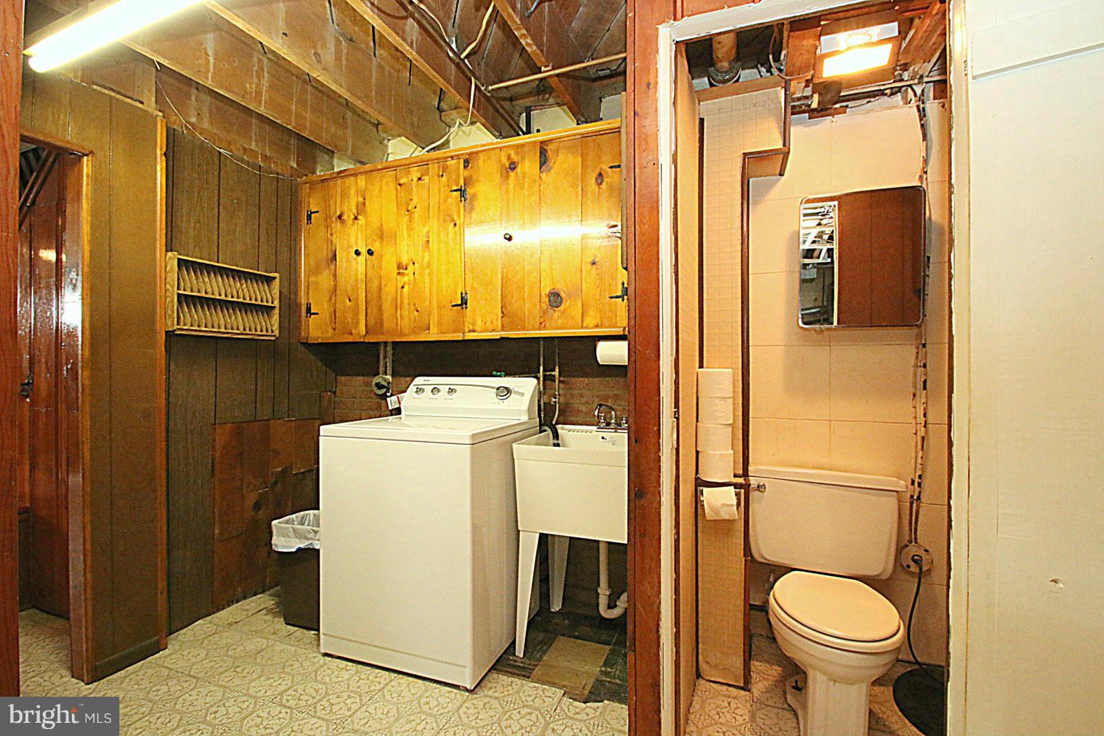 2004 Jasmine Road Baltimore, MD 21222 - Photo 28 of 29 a bathroom with a sink and toilet