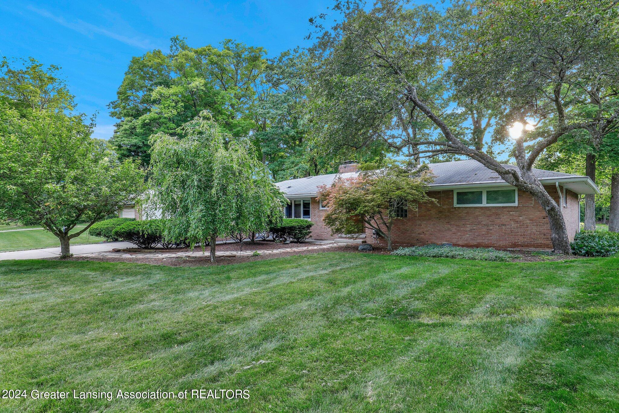 4751 Woodcraft Road Okemos, MI 48864 - Photo 1 of 34 4-web-or-mls-Open Ended Media-4