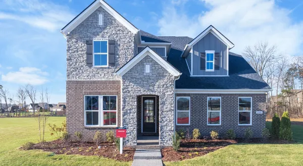 a front view of a house with swimming pool