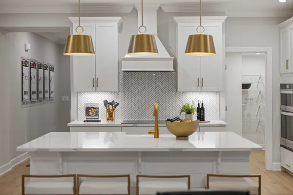 a kitchen with cabinets and window