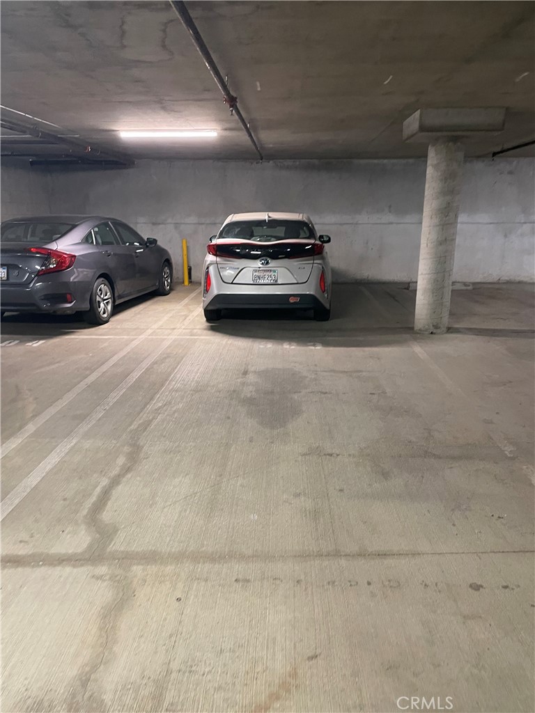160 South Hudson Avenue, Unit 303 Pasadena, CA 91101 - Photo 14 of 14 a car parked in parking