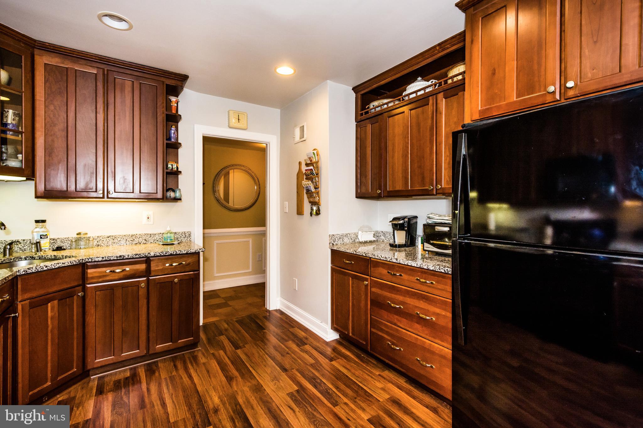 22 Cross Keys Road, Unit 22C Baltimore, MD 21210 - Photo 2 of 38 Newer Kitchen with laminate flooring.
