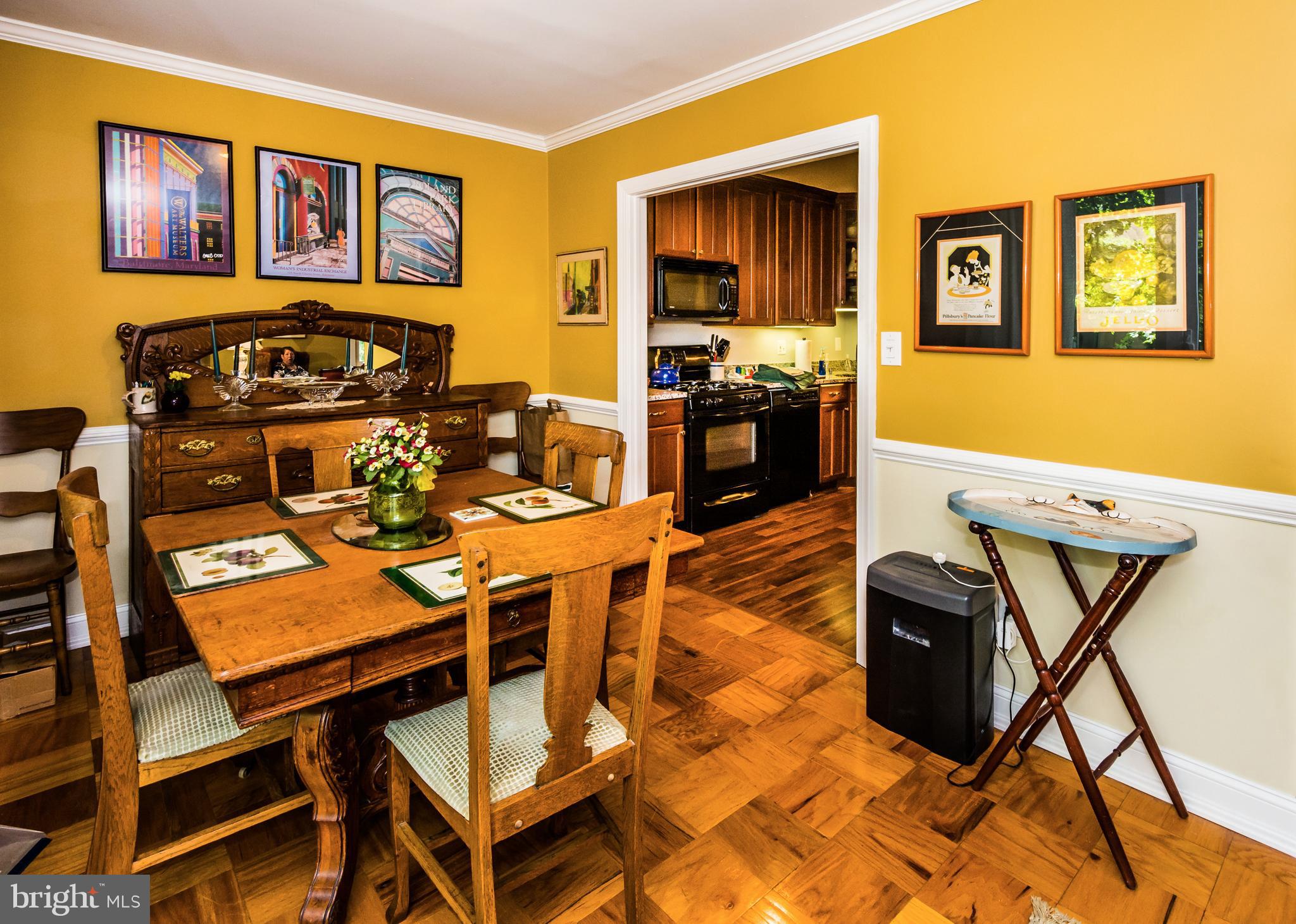 22 Cross Keys Road, Unit 22C Baltimore, MD 21210 - Photo 12 of 38 Lovely Dining Room /wood floor.