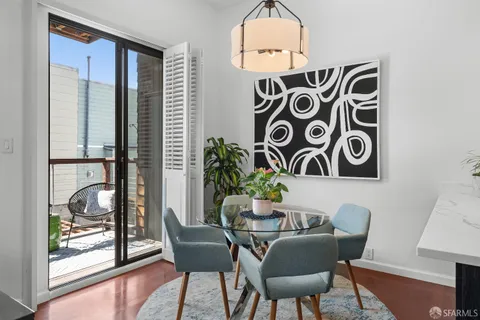 a view of a table and chairs in a room