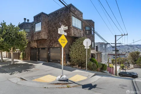 a kitchen with stainless steel appliances a refrigerator sink and cabinets