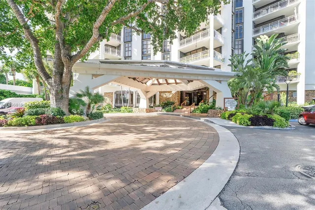 a view of a building with a street