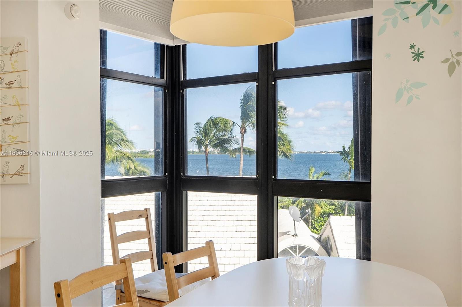 4000 Towerside Terrace, Unit 402 Miami, FL 33138 - Photo 12 of 54 a view of a large window with an outdoor space