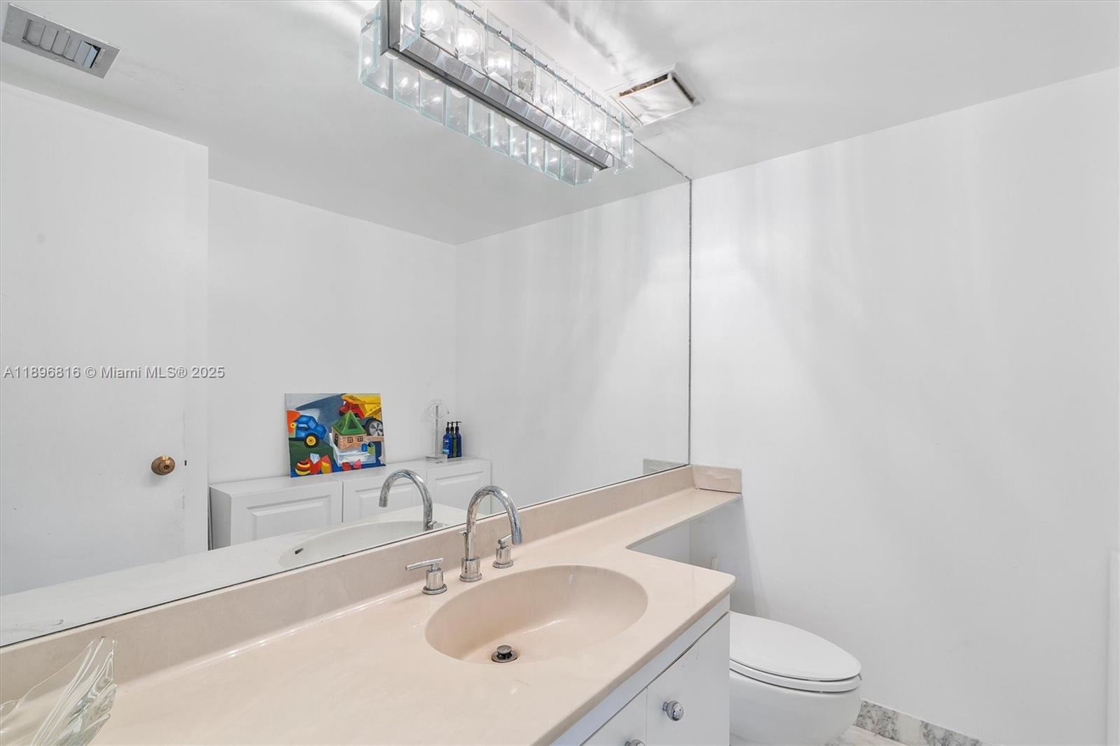 4000 Towerside Terrace, Unit 402 Miami, FL 33138 - Photo 20 of 54 a bathroom with a sink toilet and shower