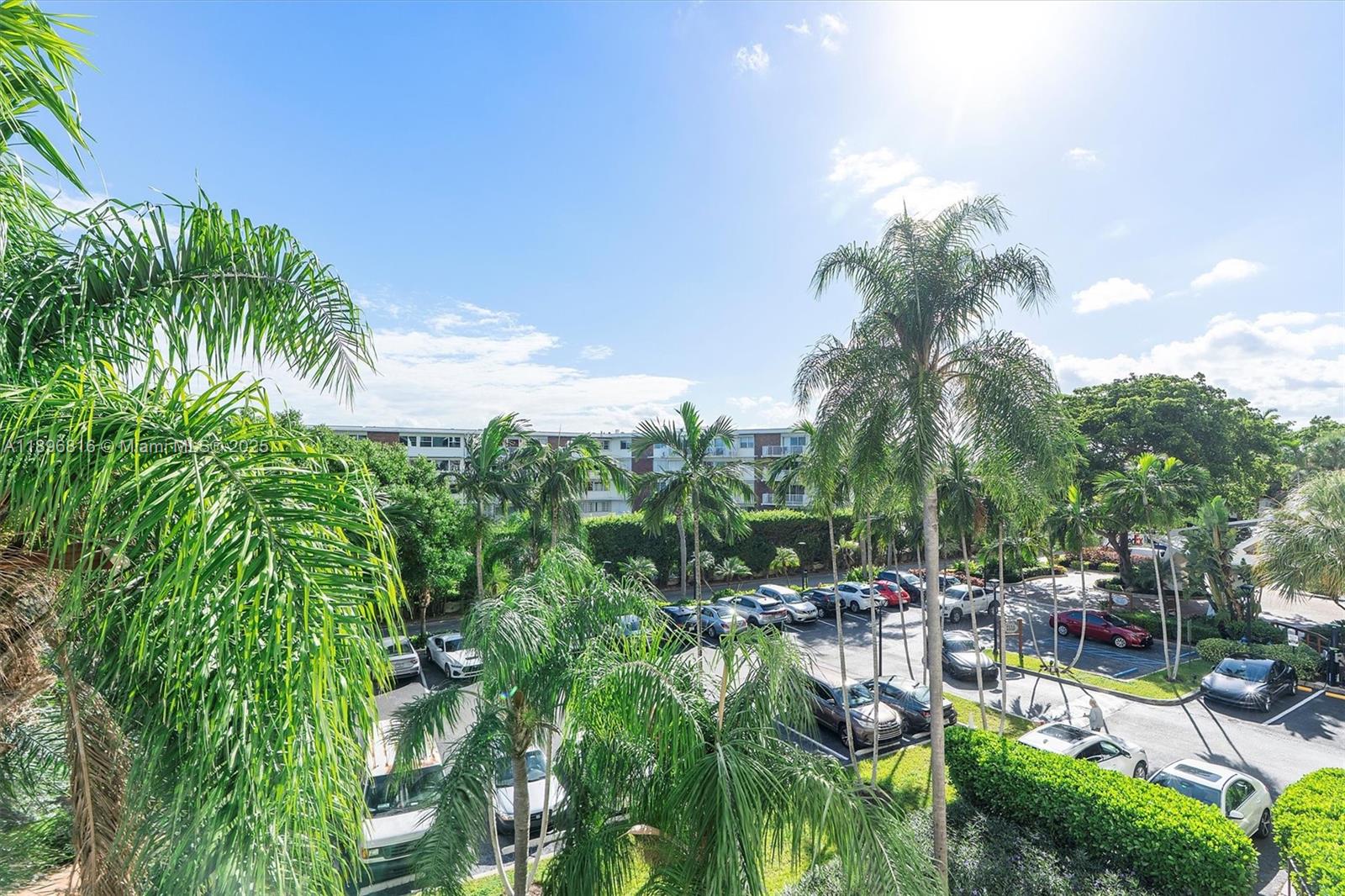 4000 Towerside Terrace, Unit 402 Miami, FL 33138 - Photo 39 of 54 a view of swimming pool and outdoor seating