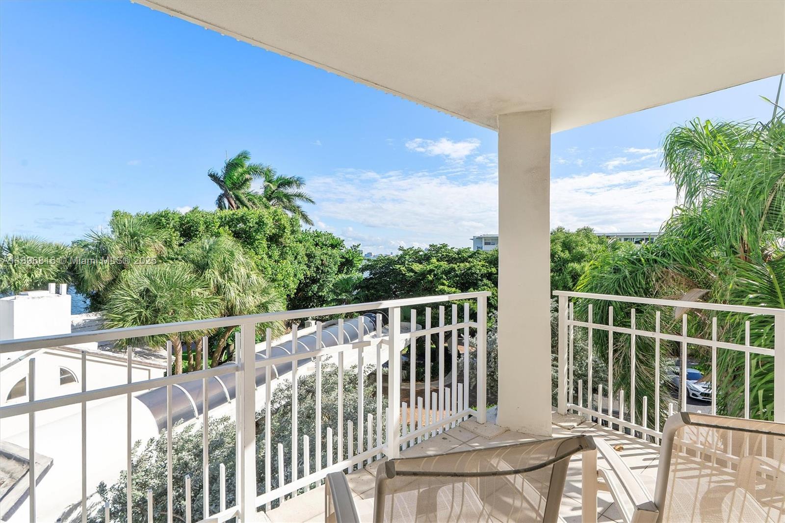 4000 Towerside Terrace, Unit 402 Miami, FL 33138 - Photo 40 of 54 a view of a chair and table in the balcony
