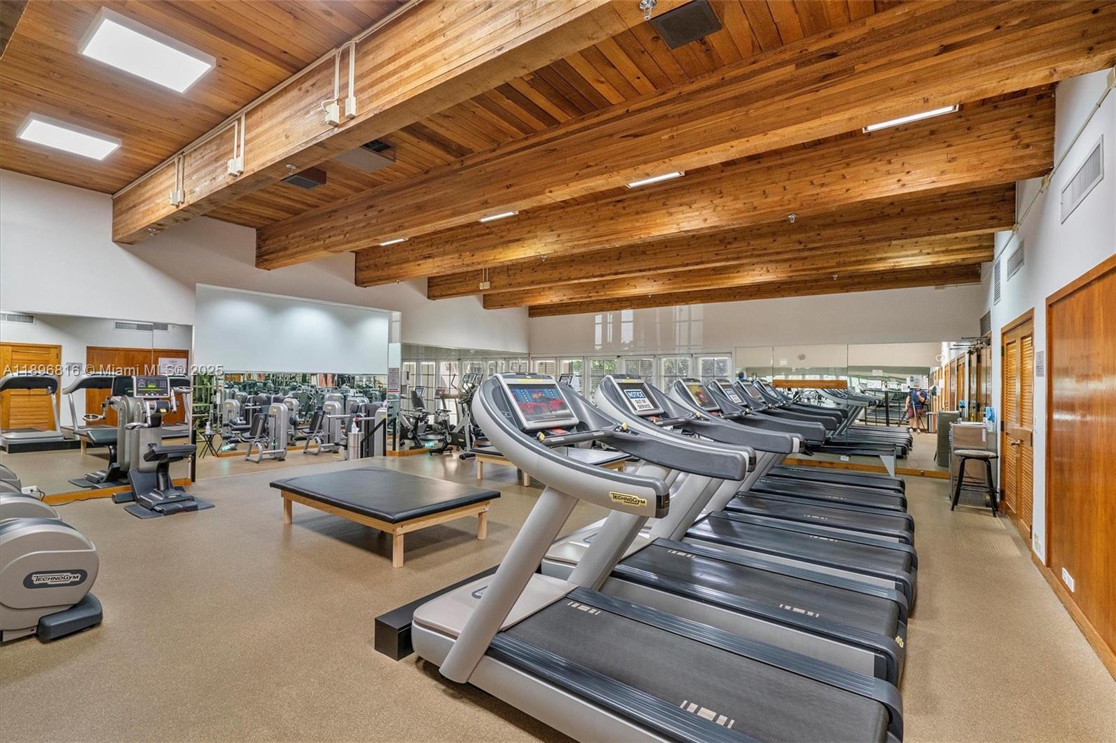 4000 Towerside Terrace, Unit 402 Miami, FL 33138 - Photo 48 of 54 a view of a gym with wooden floor