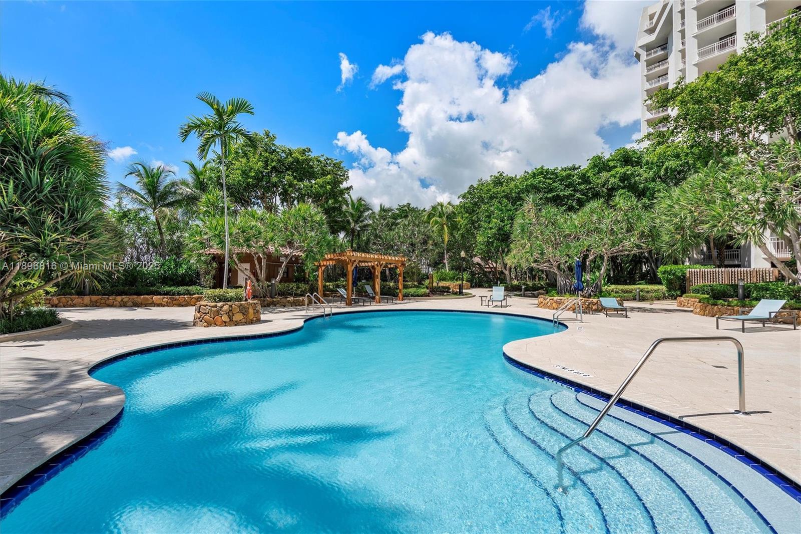 4000 Towerside Terrace, Unit 402 Miami, FL 33138 - Photo 54 of 54 a view of swimming pool with chairs