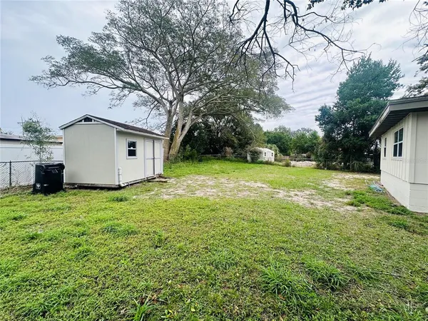a view of a backyard with a garden