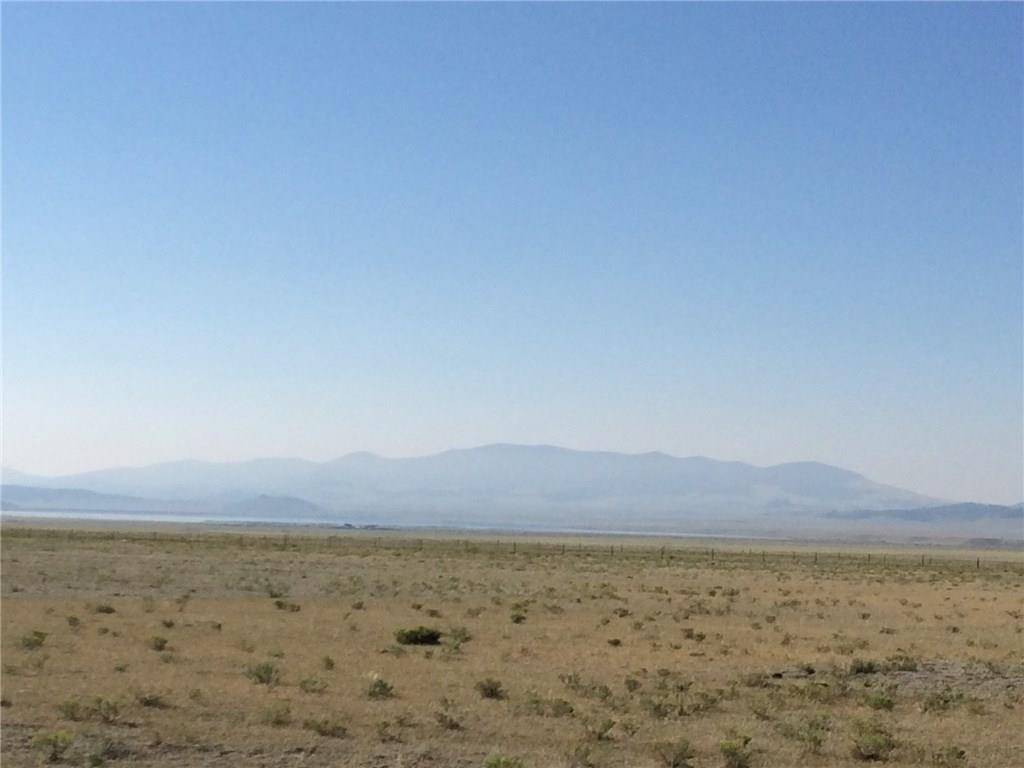 8437 Routt Road Hartsel, CO 80449 - Photo 5 of 7 a view of an ocean beach and mountain