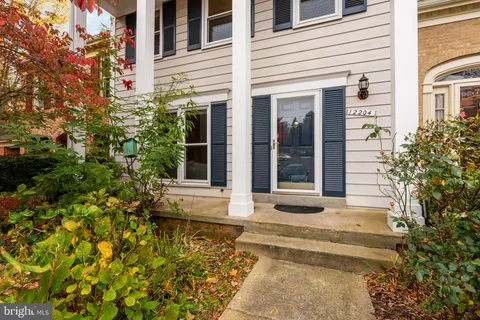 a view of a brick house with windows
