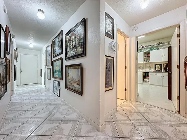 a workspace with furniture and a book shelf