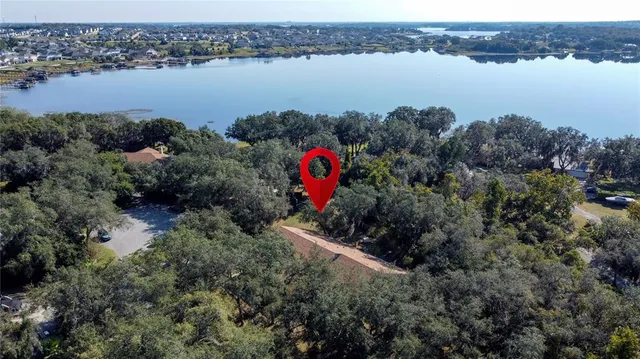 an aerial view of residential house with outdoor space