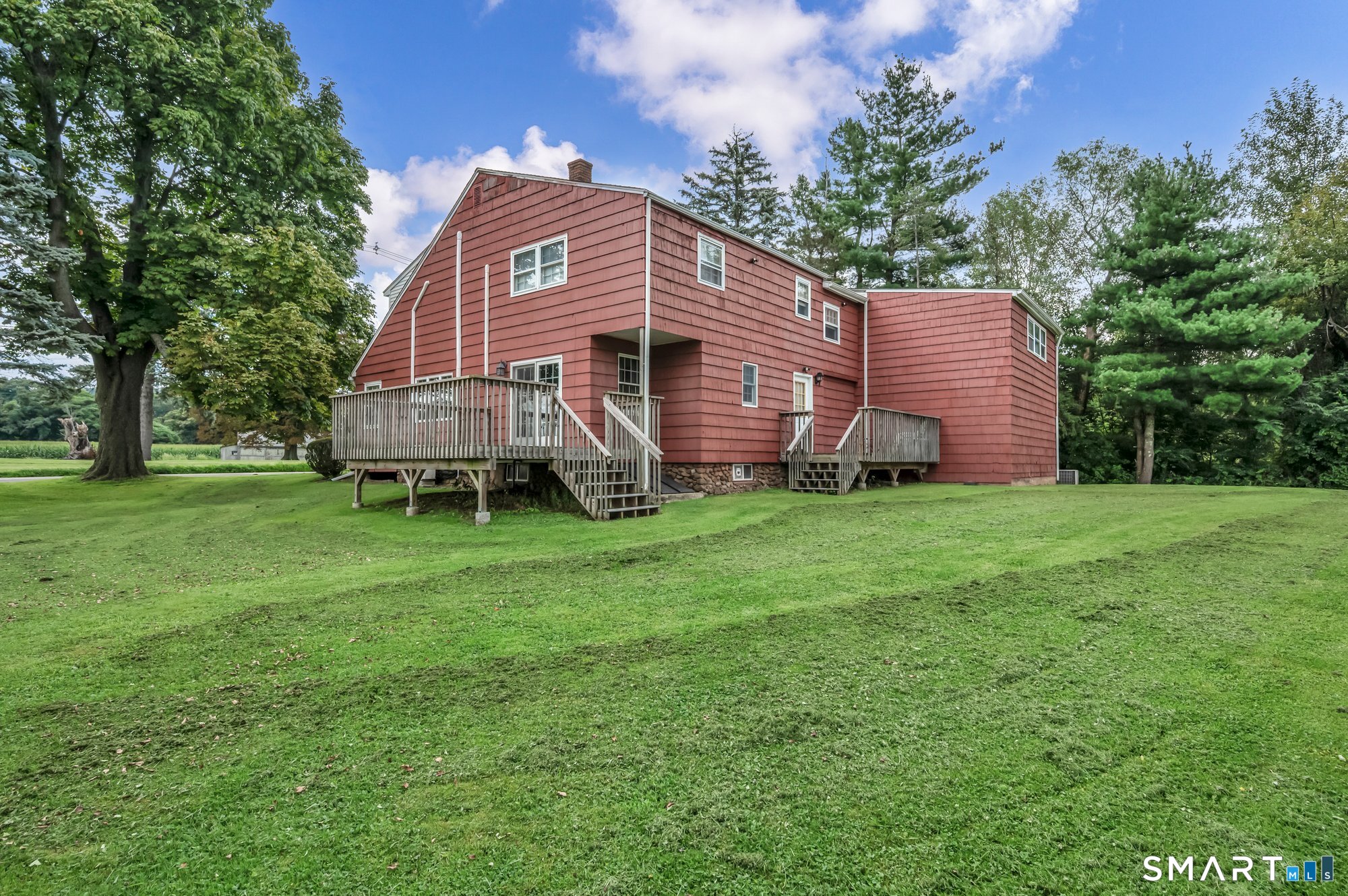 Back side of house - Trex decking- views of spacious yard