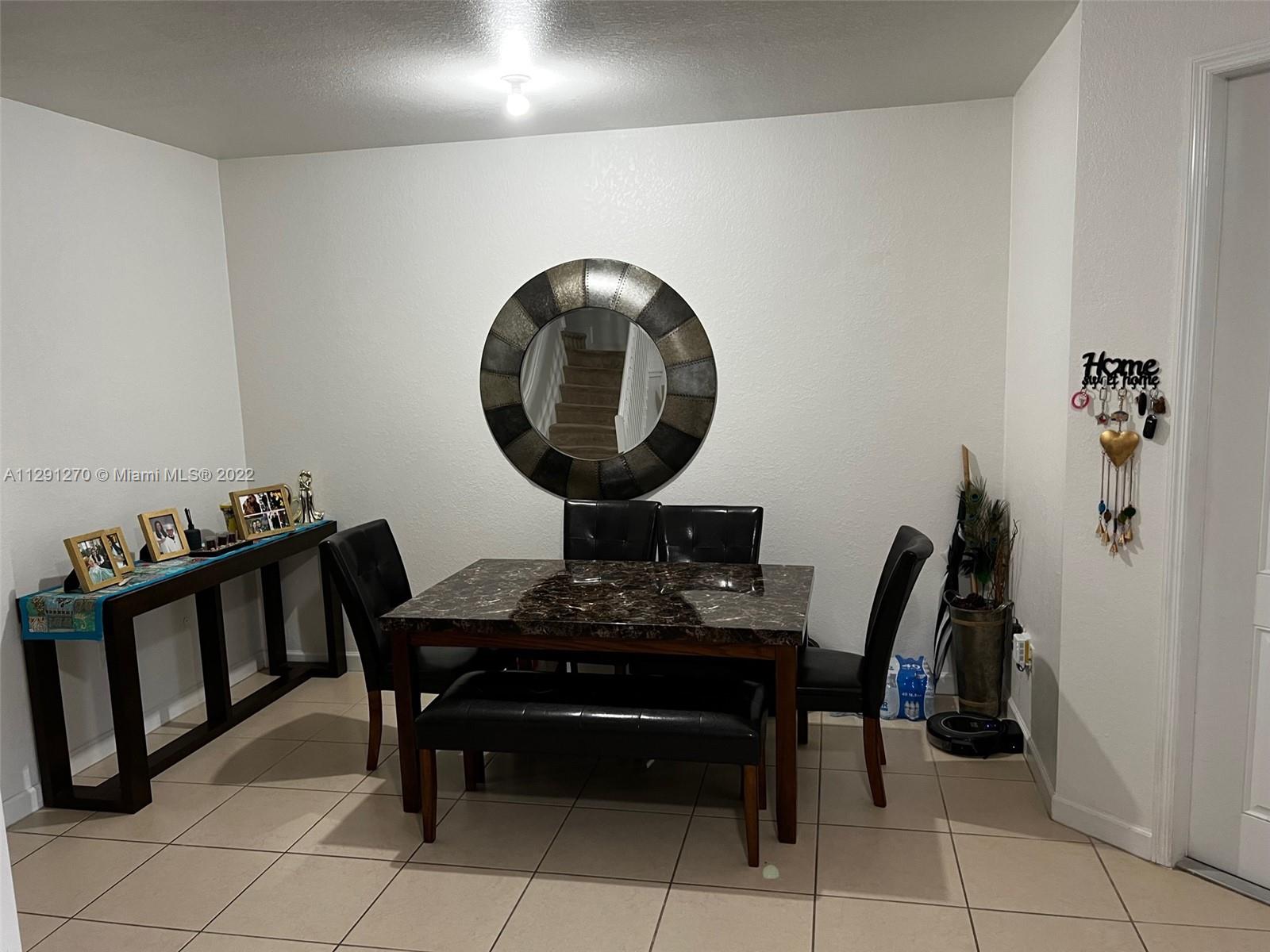 Oasis Homestead, FL 33033 - Photo 19 of 24 a view of a workspace with furniture