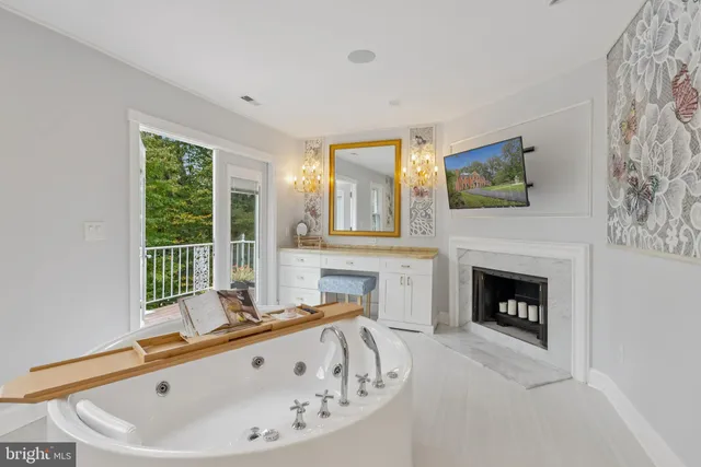 a bathroom with a granite countertop sink mirror and shower