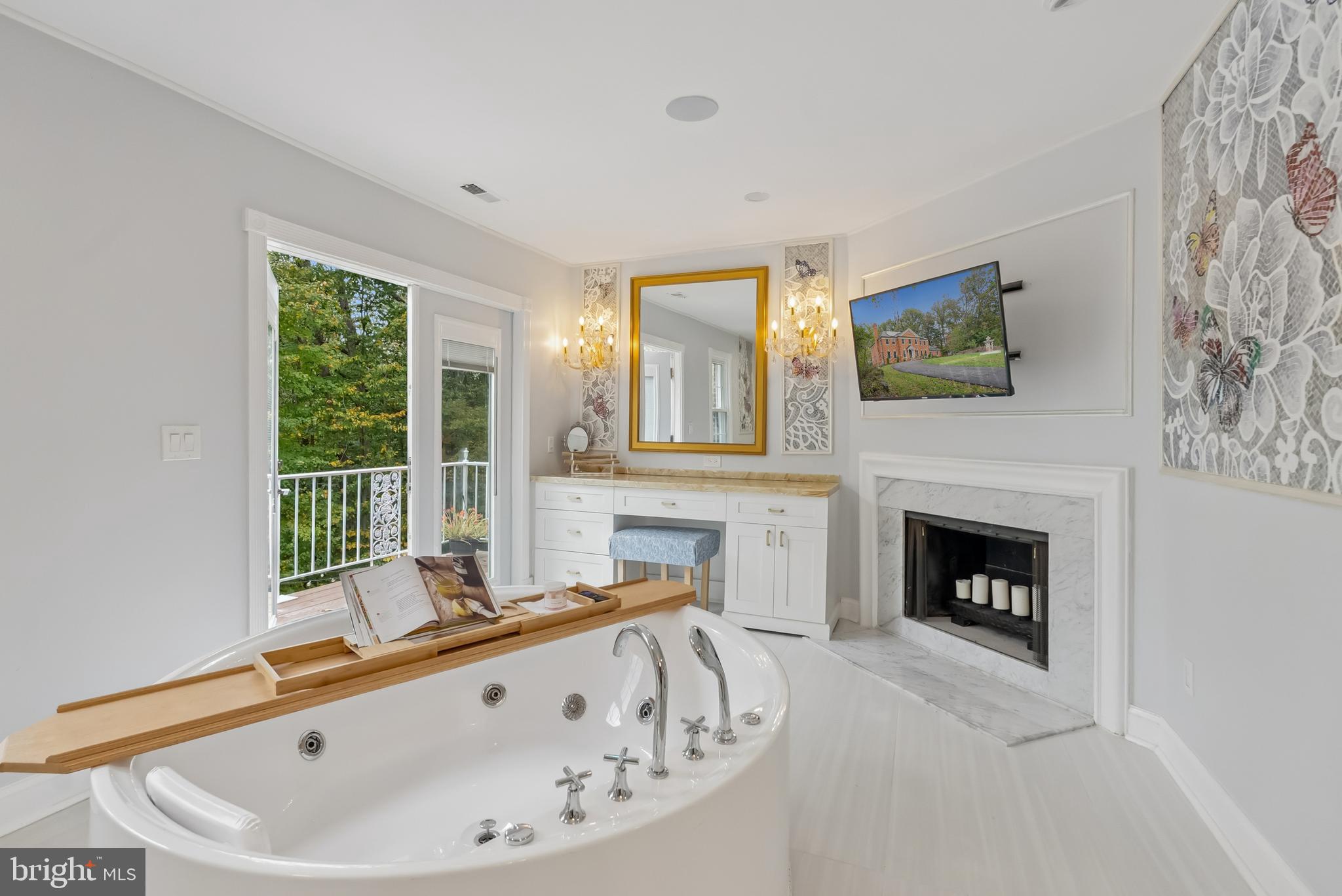 10900 Tara Road Potomac, MD 20854 - Photo 18 of 33 a living room with furniture and a fireplace