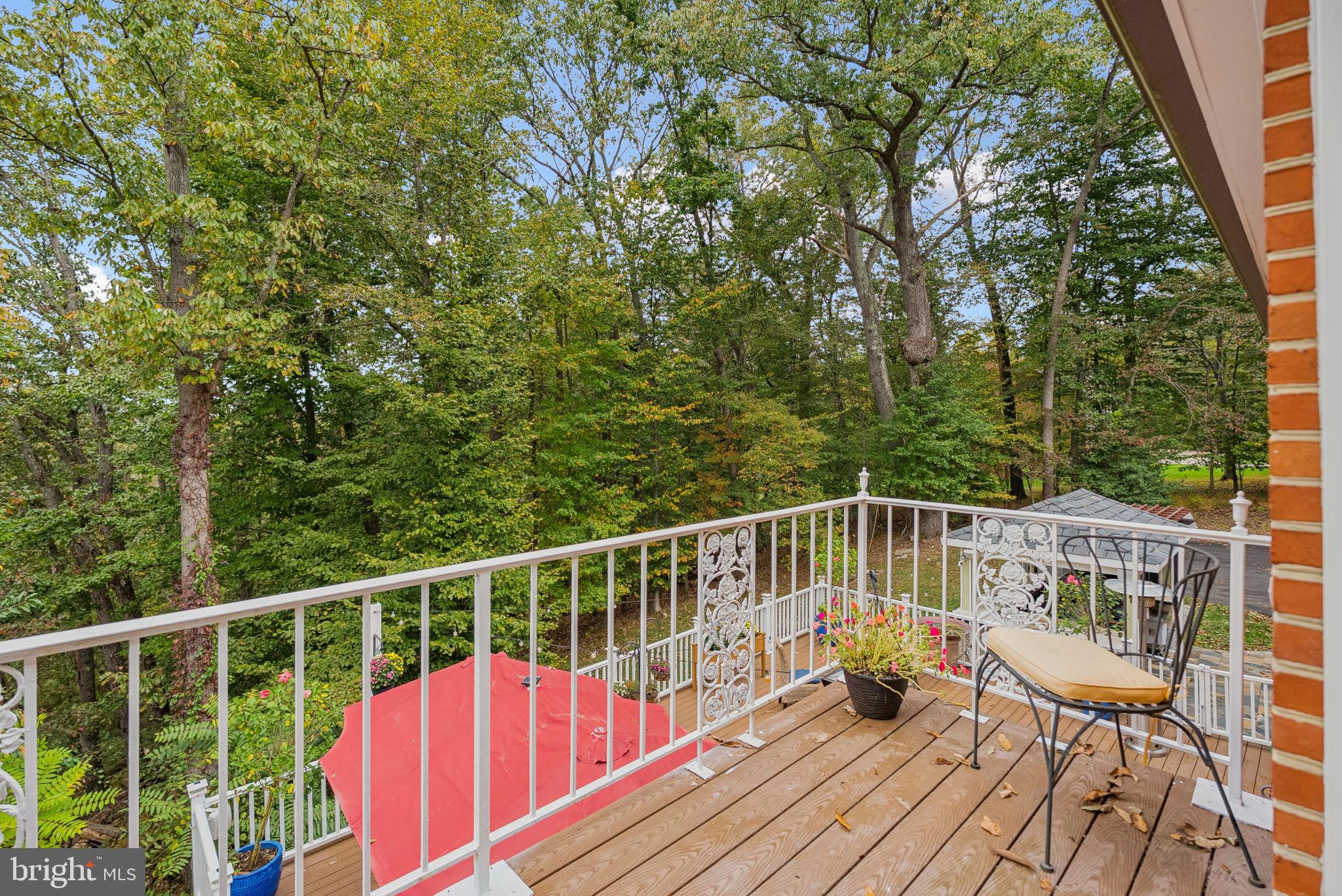 10900 Tara Road Potomac, MD 20854 - Photo 20 of 33 a view of balcony with deck and outdoor seating