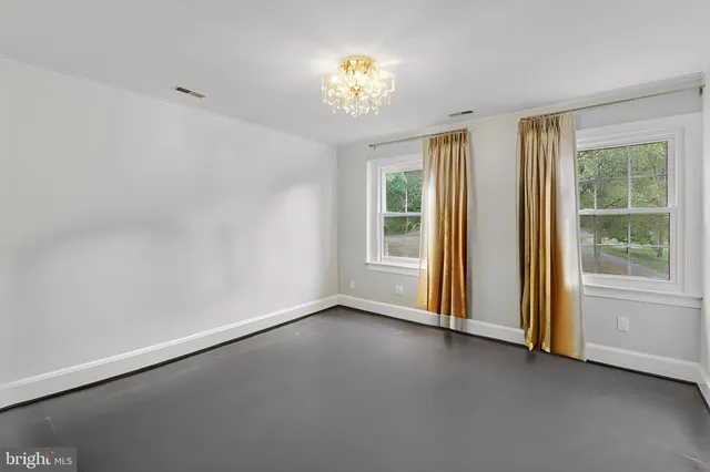 a dining room with furniture and fireplace