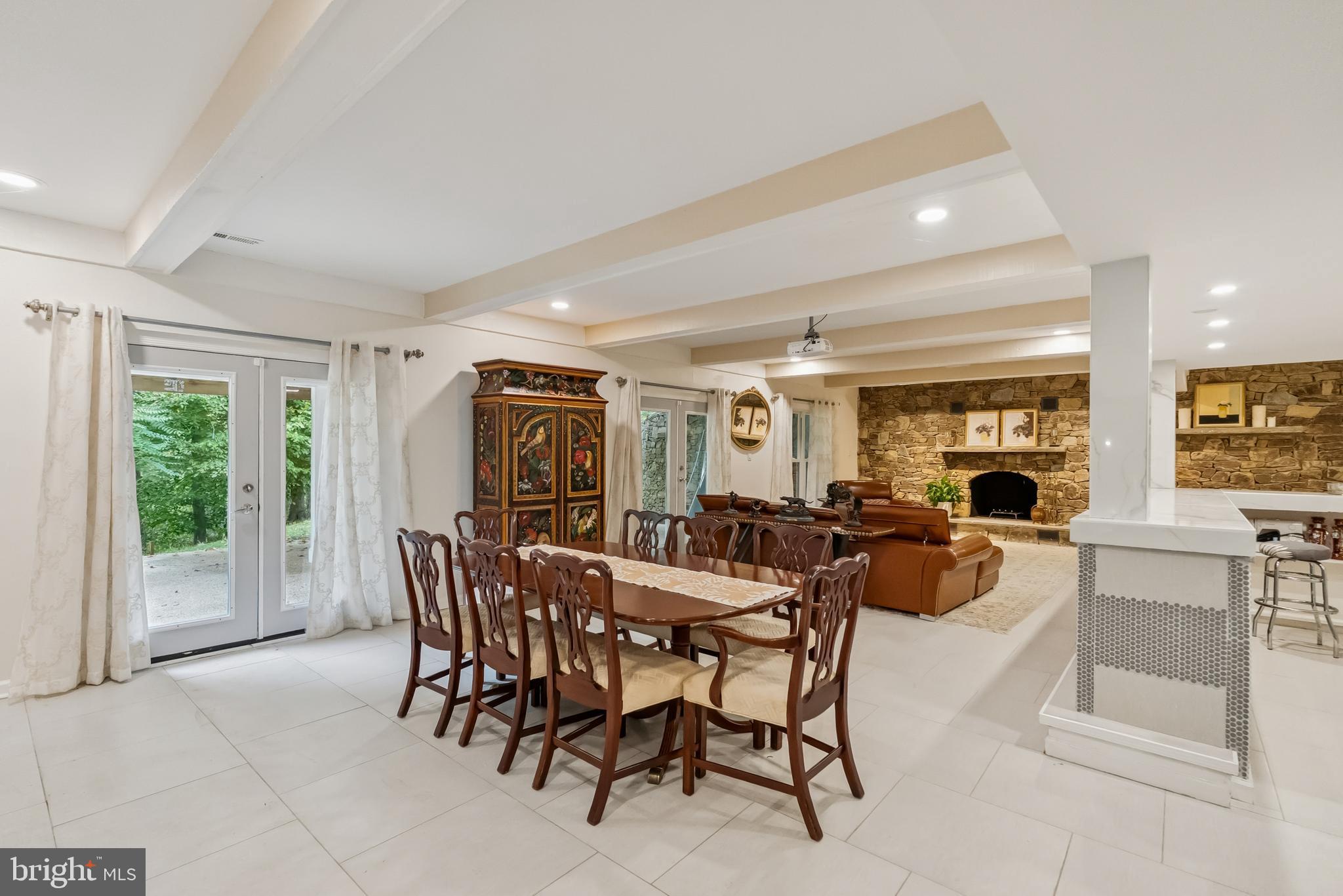 10900 Tara Road Potomac, MD 20854 - Photo 27 of 33 a dining room with furniture and fireplace